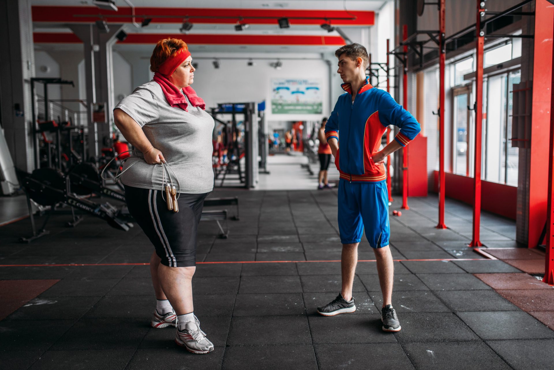 fat-woman-talks-with-instructor-after-exercise-2021-08-26-16-26-07-utc-scaled–3 fat woman talks with instructor after exercise utc scaled